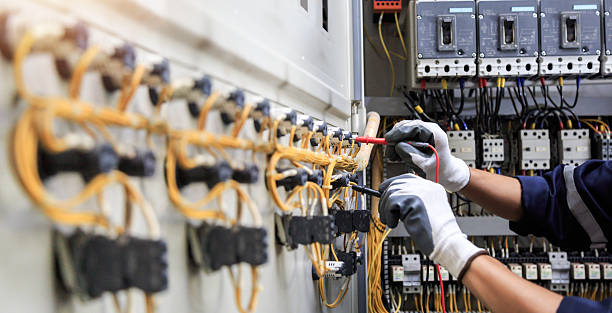 Professional Electrician technician working in DuPont, WA